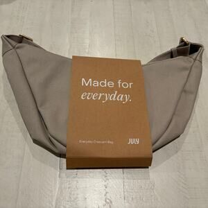 July Everyday Crescent Bag in the color Natural NWT